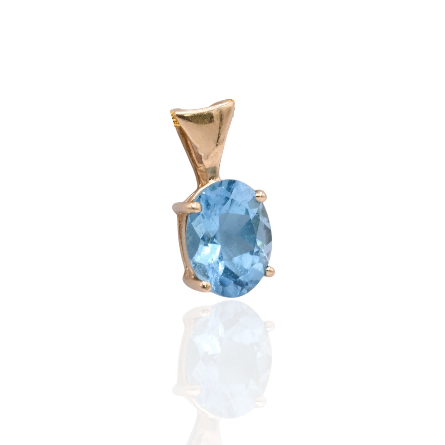 Oval Blue Topaz Basket Set Pendant 14K Yellow Gold