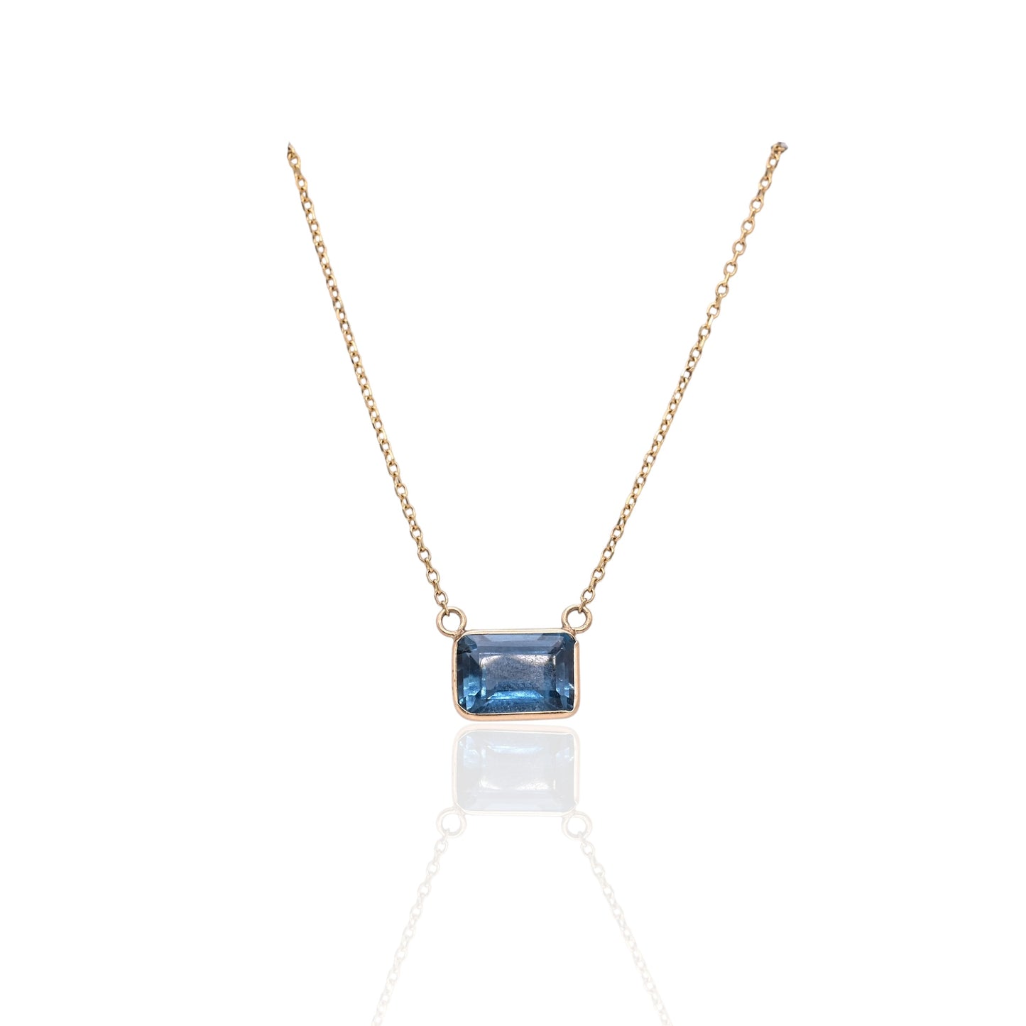 East to West Bezel Blue Topaz Necklace 14K Yellow Gold Adjustable Diamond Cut Chain 16.25in, 17.25in, and 18.25in 1.30cttw