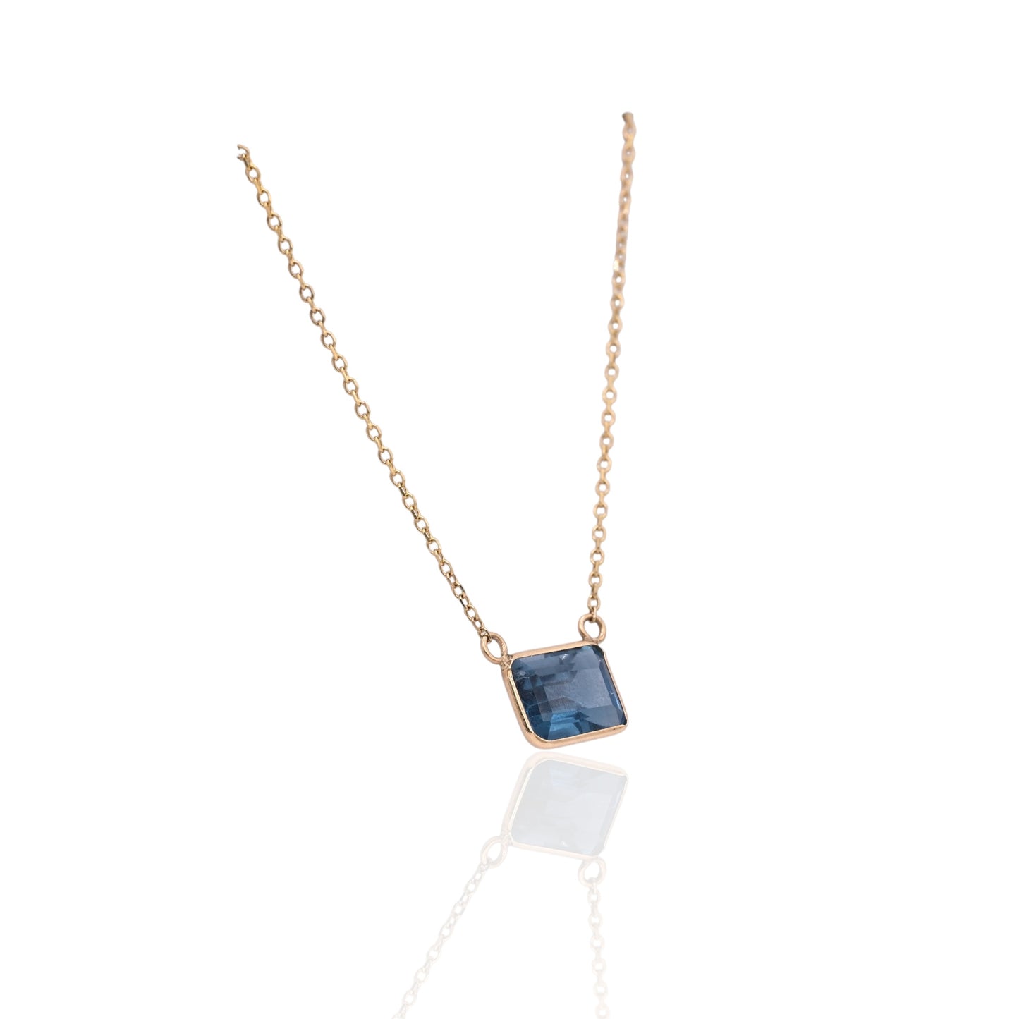 East to West Bezel Blue Topaz Necklace 14K Yellow Gold Adjustable Diamond Cut Chain 16.25in, 17.25in, and 18.25in 1.30cttw